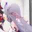 a blurred image of a person with purple hair holding a cell phone .