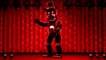 a black teddy bear wearing a top hat and bow tie is standing in front of a red curtain