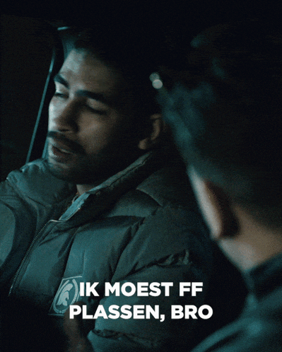 a man in a car with the words ik moest ff plassen bro