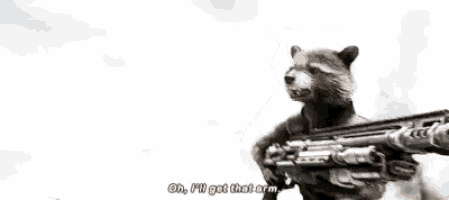 rocket raccoon from guardians of the galaxy is holding a gun in his hands .