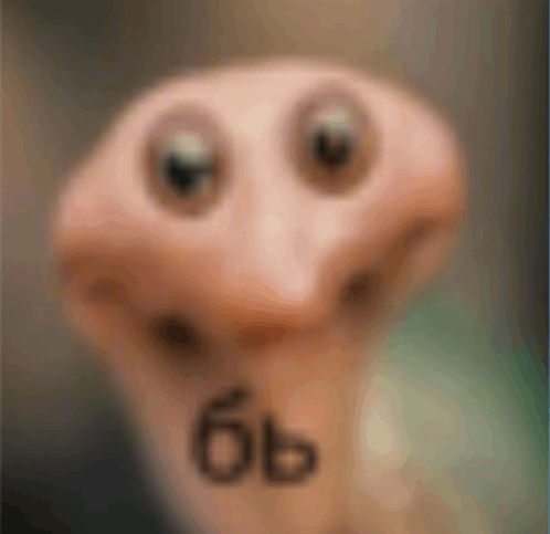 a blurred image of a worm with the number 6 on it 's face