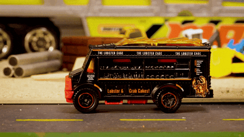 a toy truck that says the lobster cage on it