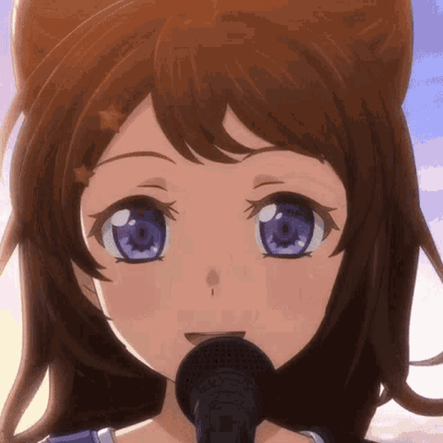 a close up of a girl singing into a microphone