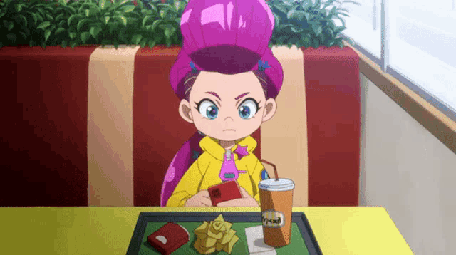 a cartoon girl with purple hair is sitting at a table with a drink and a cell phone .