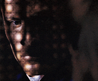 a close up of a person 's face with a pattern of dots on it