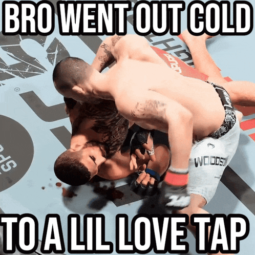 a picture of two men in a wrestling match with the caption " bro went out cold to a lil love tap "