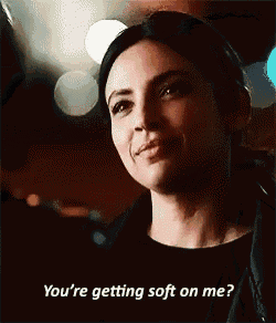 a woman is smiling and asking if she 's getting soft on her .