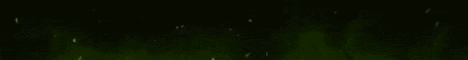 a green light is shining on a black background in a dark room .