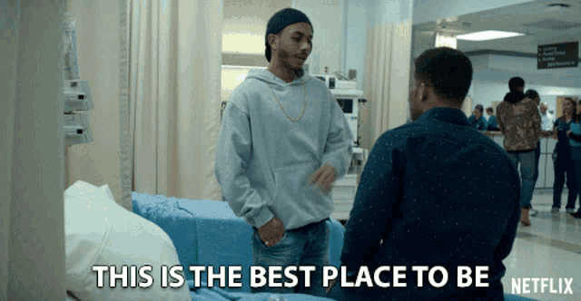 a netflix advertisement shows two men talking in a hospital