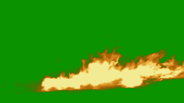 a large fire on a green screen