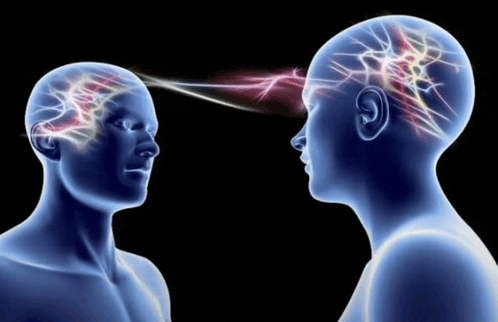 a man and a woman are looking at each other and their brains are lit up