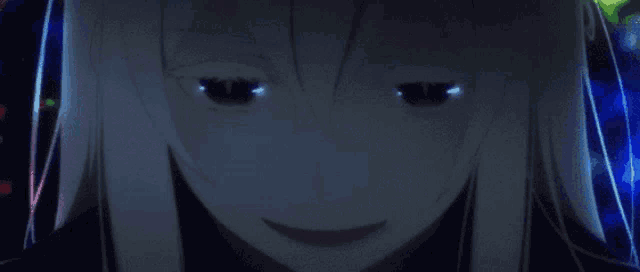 a close up of a girl 's face with her eyes glowing in the dark