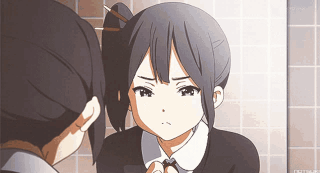 a girl is looking at herself in a mirror with tokyo mx written on the bottom right