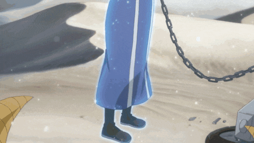 a person in a blue skirt is chained to a wheel