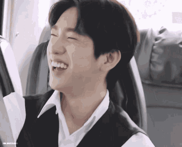 a close up of a person 's face with the words " mr. jinyoung " on the bottom left