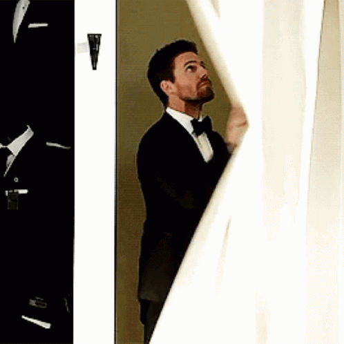 Stephen Amell Oliver Queen GIF - Stephen Amell Oliver Queen Curtain GIFs