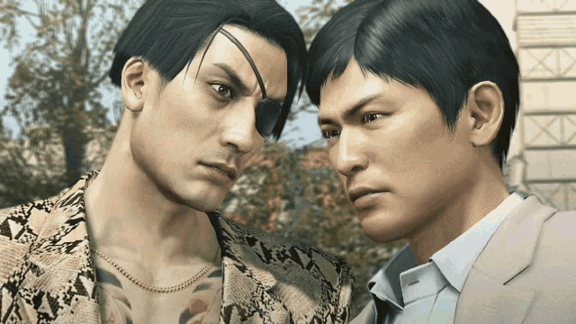 two men are standing next to each other and one has a tattoo on his arm