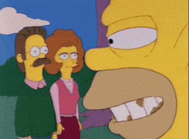 a couple of cartoon characters standing next to each other with a large mouth