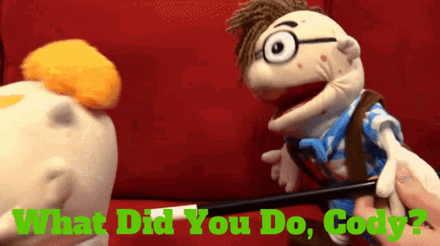 a person is holding a puppet with the words " what did you do cody " above it