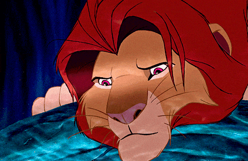 a close up of a cartoon lion with red hair and pink eyes