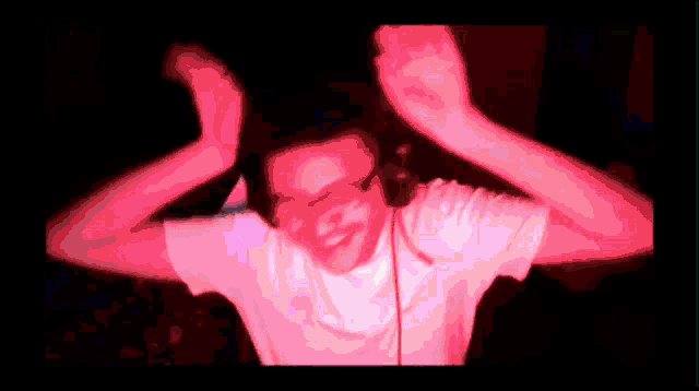 a man wearing headphones with a microphone on his head