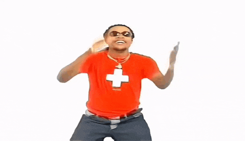 a man wearing sunglasses and a red shirt is dancing .
