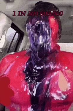 a picture of a person covered in red and purple slime with the words 1 in 300000000 on the bottom right