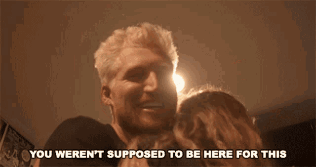 a man says " you weren 't supposed to be here for this " in a dark room
