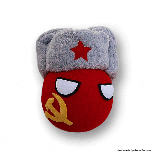 a stuffed red ball with a hammer and sickle and a star on it is handmade by anna fortune