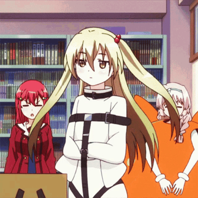 a girl in a straitjacket with her arms crossed