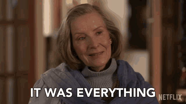 a woman in a blue scarf says it was everything