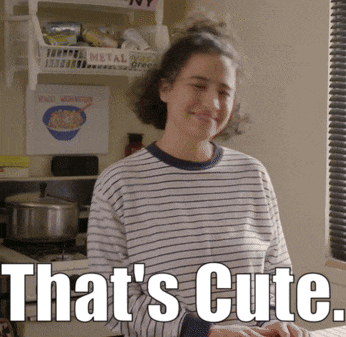 a woman in a striped shirt says that 's cute in white letters
