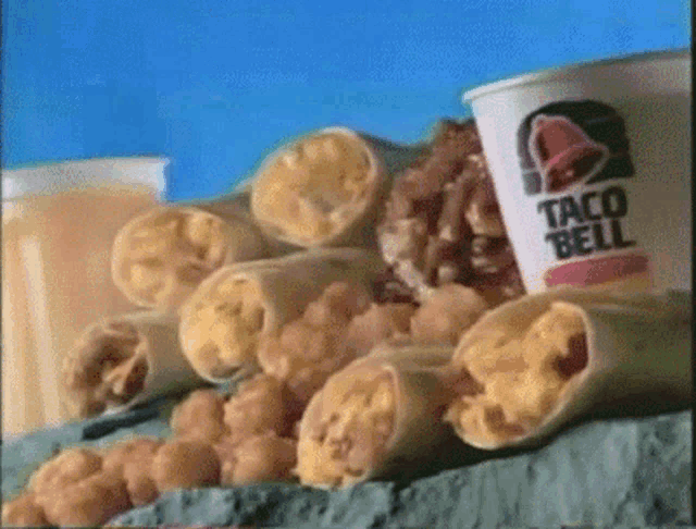 a taco bell advertisement shows a variety of food and drinks