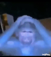 a blurry picture of a person 's face with the words imgplay in the corner