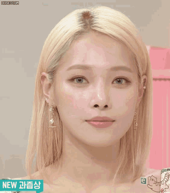 a close up of a woman 's face with the words honeycam on the bottom