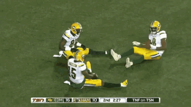 hazelton is number 15 on the green bay packers and is laying on the ground