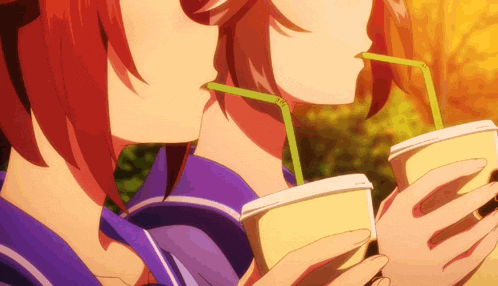 a couple of anime girls drinking through straws