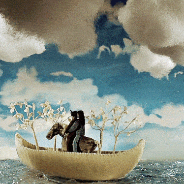 a man riding a horse in a boat with trees