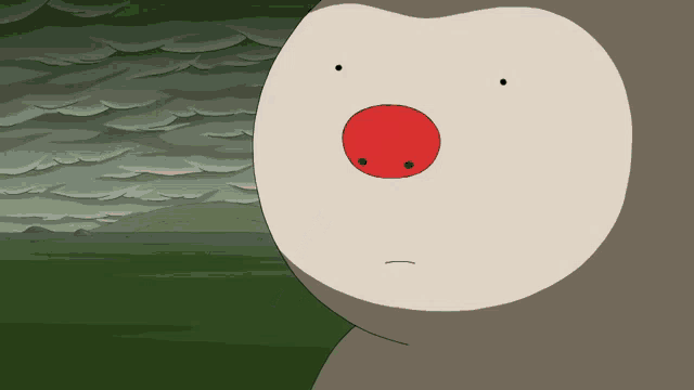 a cartoon character with a red nose has a sad look on its face