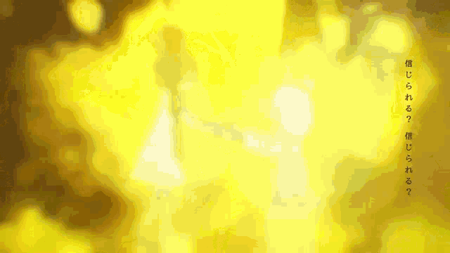 a blurred image of a person holding hands with a yellow background