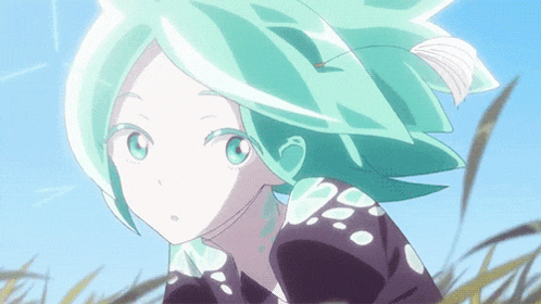 a close up of a girl with green hair and blue eyes