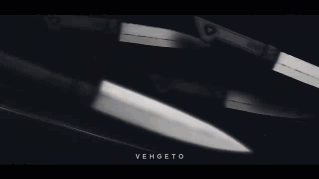 a black and white animated background with the words vehgeto on the bottom