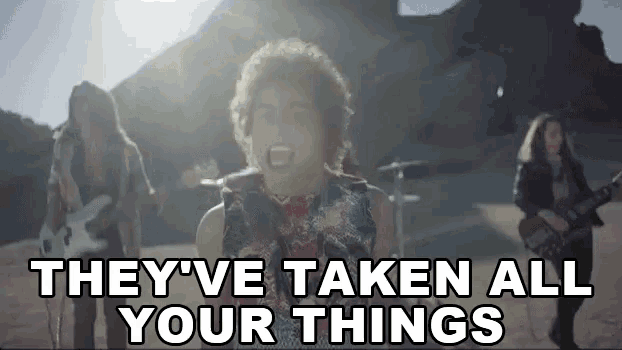 a group of people singing and playing guitars with the words " they 've taken all your things "