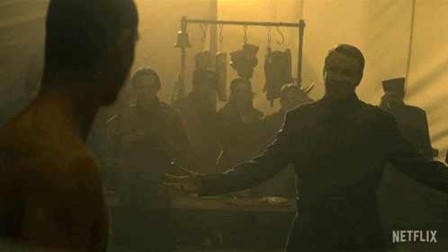 a netflix ad shows two men fighting in a room