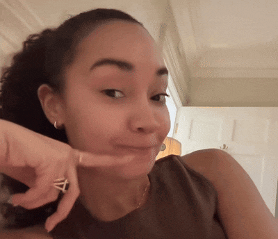 a woman with a diamond ring on her finger