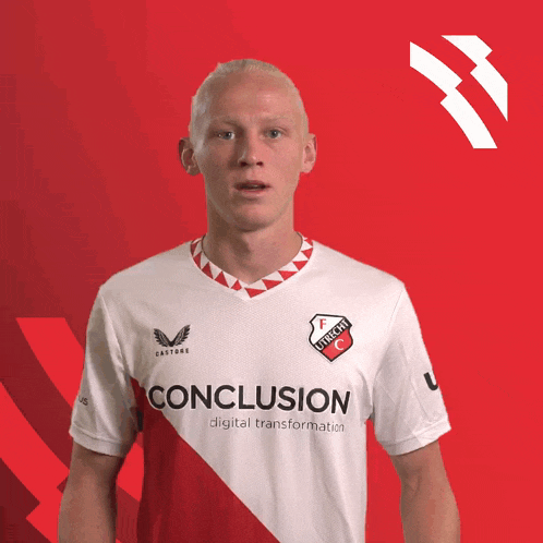 a man wearing a shirt that says conclusion on the front