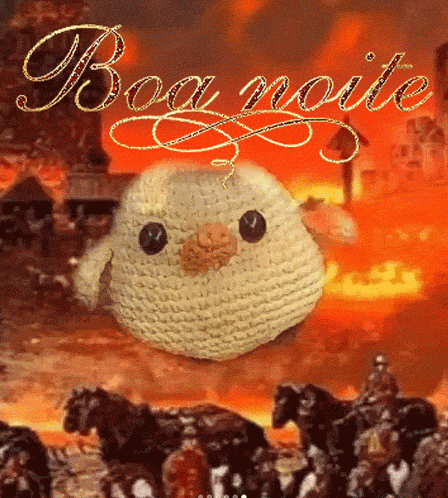 a crocheted chicken with the words boa noite written on it