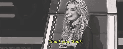 a woman is sitting in a chair and saying thank you , god !