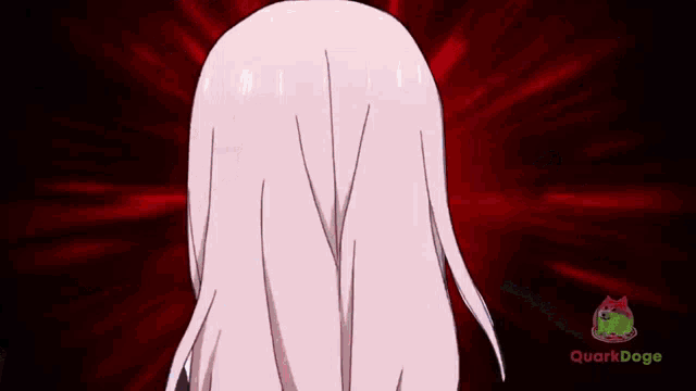 a girl with a bow on her head is looking at the camera with her mouth open .