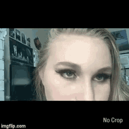 a close up of a woman 's face with no crop